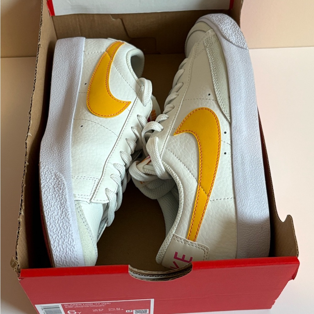 Nike Blazer Low White Sneakers with Yellow Swoosh